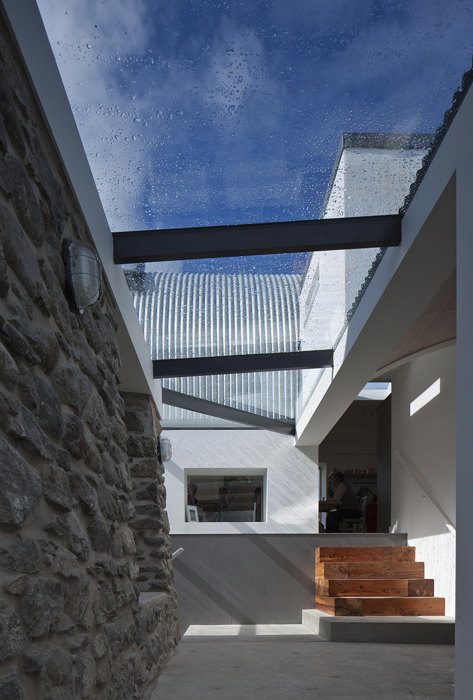 Stone-walls-glass-ceiling
